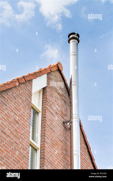 installing metal chimney on house|install stainless steel chimney pipe.